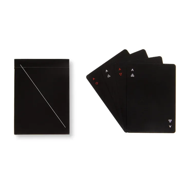 Black Areaware Minim playing cards fanned out next to the box