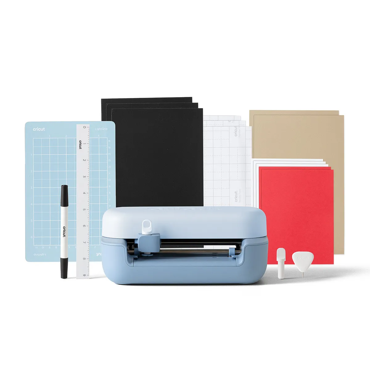Cricut Joy 2 in blue with a mat, cardstock, vinyl, a ruler, a pen and tools from the bundle