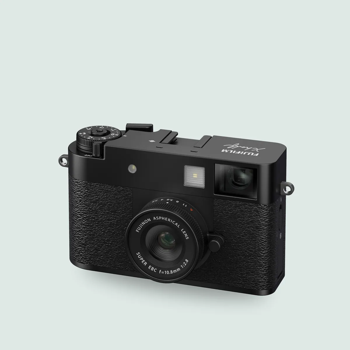 Fujifilm X half compact camera in black, seen from the front at an angle