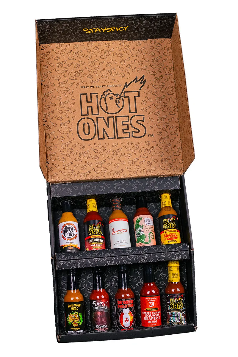 Open Hot Ones gift box with the ten Season 29 hot sauce bottles