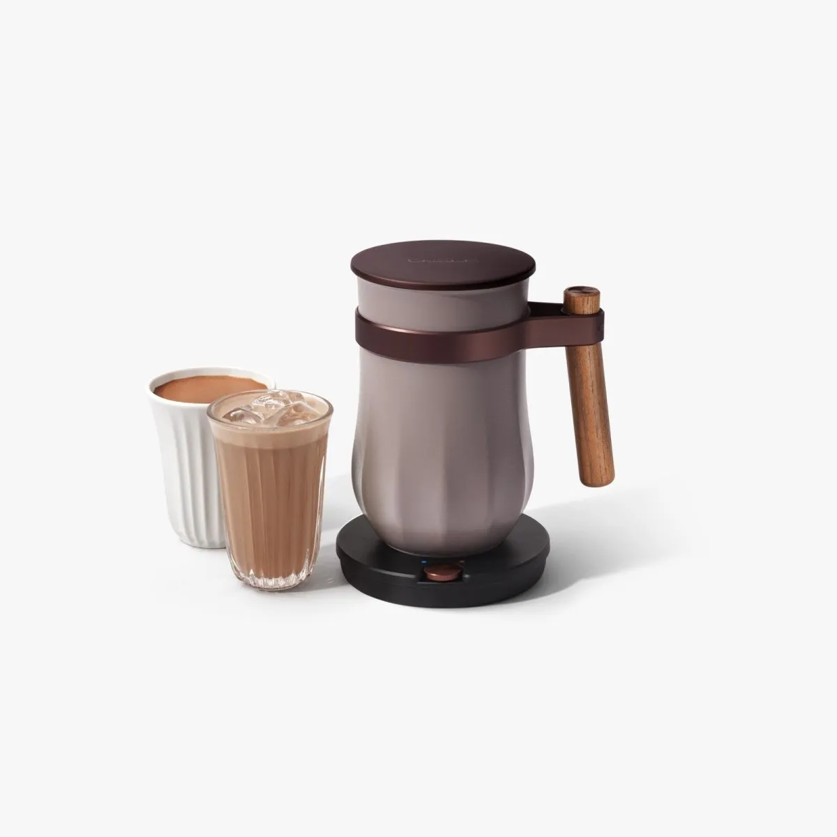 Hotel Chocolat Velvetiser in Pebble with a mug of hot chocolate and a glass of iced chocolate