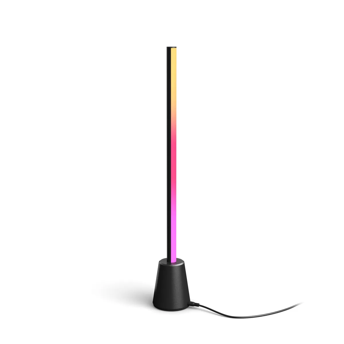 Philips Hue Play table lamp, a slim black light bar on a round base, glowing in a gradient from yellow to pink and purple