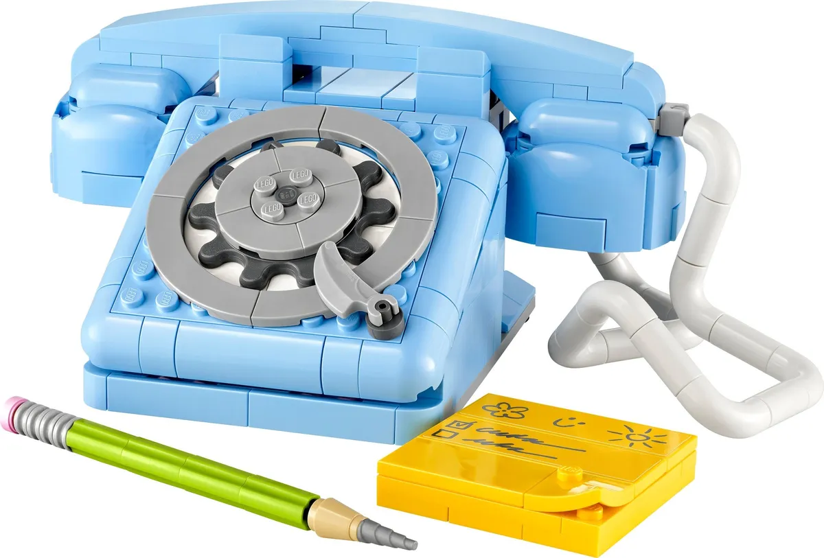 LEGO Creator Retro Telephone 31174 built as a light blue 1960s rotary phone with pencil and notepad