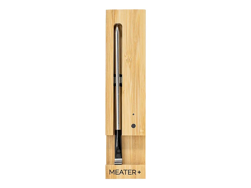 MEATER Plus probe in its bamboo charging block