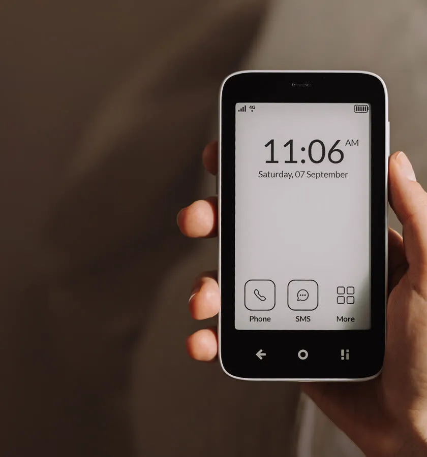 Mudita Kompakt E Ink phone in a hand