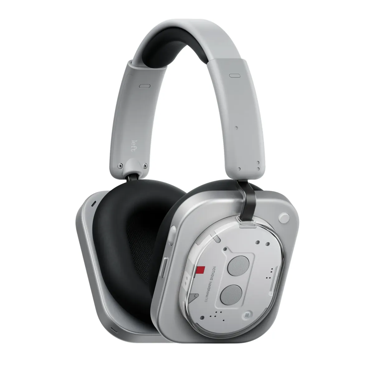 Nothing Headphone (1) in white, seen from the side with the transparent cassette-style ear cup