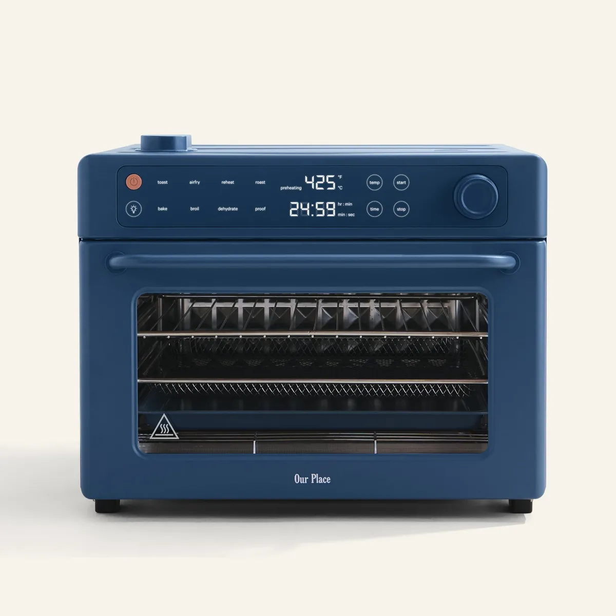 Our Place Wonder Oven Pro in Blue Salt with its touch control panel and three racks