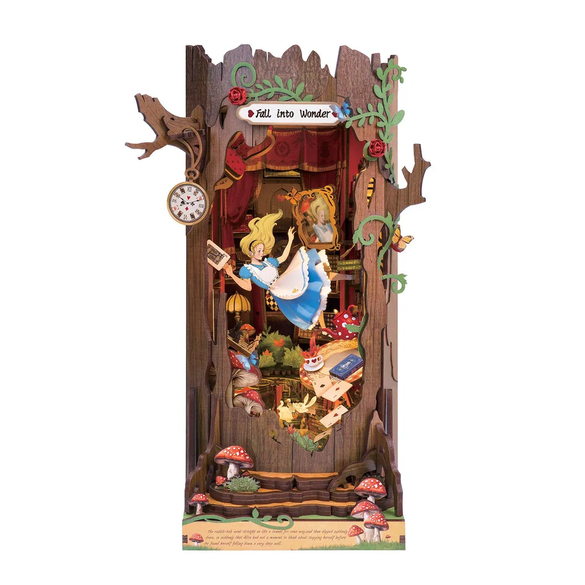 Rolife Fall into Wonder DIY book nook kit, a wooden tree trunk with a falling girl, pocket watch, red toadstools and a lit interior